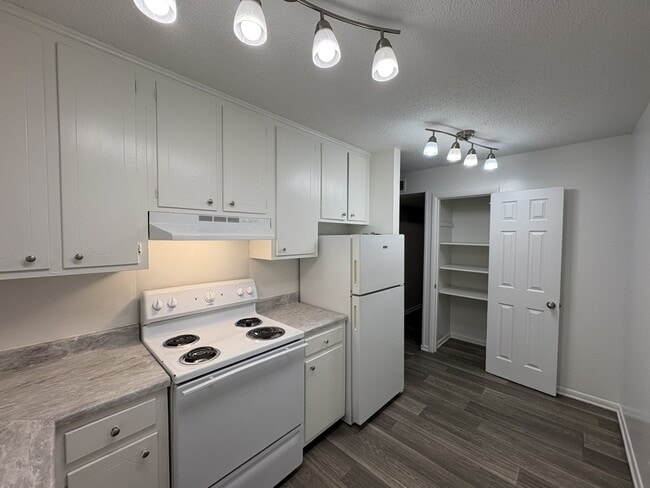 Two bedroom W Patio - (Kitchen) - Pine Brook Apartments