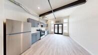 Welcome to your dream urban oasis, where style meets functionality in the heart of Olympia. This exquisite 360 square foot studio apartment is a testament to smart living, offering a canvas for your aspirations and a launchpad for your ambitions.

Step into a world of contemporary elegance, where every inch has been thoughtfully designed to maximize space and elevate your lifestyle. The open-concept layout creates a sense of expansiveness, with sleek wood-look flooring that flows seamlessly throughout, reflecting light and adding warmth to your living space.

The kitchen is a culinary enthusiast's dream, boasting stylish gray cabinetry that provides ample storage, complemented by gleaming stainless steel appliances. Prepare gourmet meals or entertain friends with ease in this modern cooking haven. The subway tile backsplash adds a touch of urban sophistication, while the exposed ductwork overhead lends an industrial-chic vibe that's sure to impress.

The bathroom is a serene retreat, featuring clean lines and a minimalist design that exudes tranquility. High-quality fixtures and finishes create a spa-like atmosphere, perfect for unwinding after a long day.

Large windows flood the space with natural light, creating an airy ambiance and offering glimpses of the vibrant city beyond. The versatile living area easily transitions from a cozy lounge to a productive home office, adapting to your dynamic lifestyle.

This apartment isn't just a place to live; it's a statement of who you are and who you aspire to be. Located in the heart of Olympia, you're steps away from trendy cafes, boutique shops, and the pulsing energy of city life. Embrace the freedom of minimalist living without sacrificing style or comfort. Your urban adventure starts here – are you ready to elevate your lifestyle?