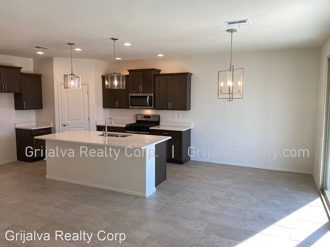 Building Photo - 4 br, 3 bath House - 10677 W Harrigan Drive