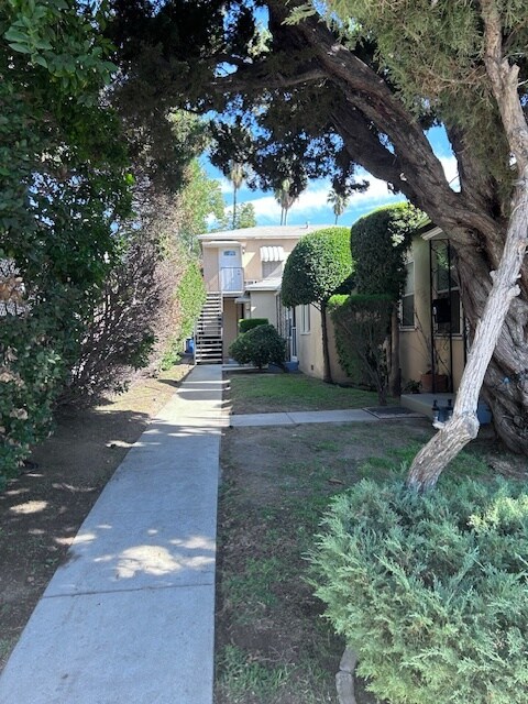 Walkway to upstairs unit D - 610 S Main St