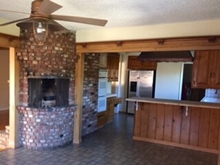 Kitchen and DIning Area Fireplace Hearth - 9666 Lemona Ave