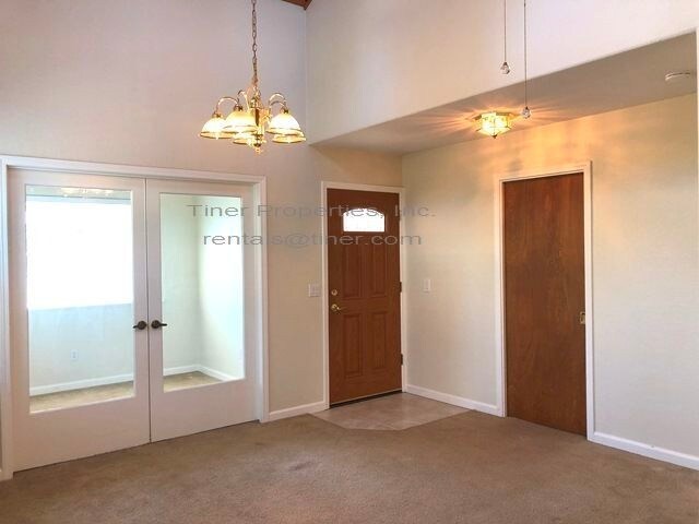 Building Photo - Adorable Duplex With White Picket Fence