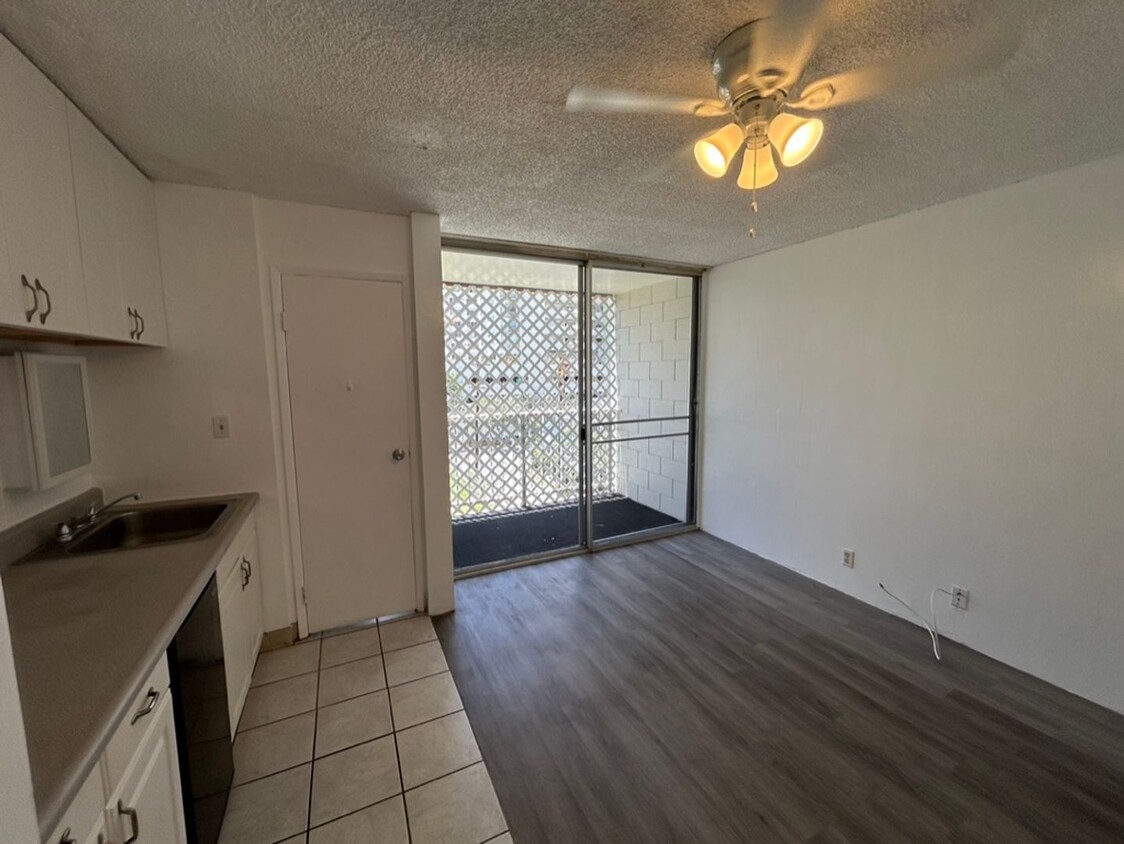 Building Photo - Upgraded studio available now in a secured...