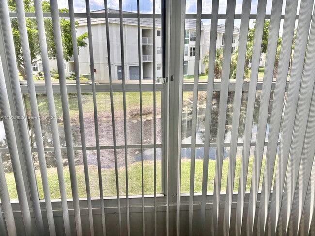 Building Photo - 8305 Sunrise Lakes Blvd