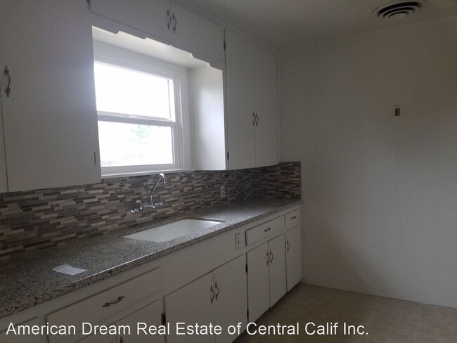 Foto del edificio - 2 br, 1 bath House - 718 E. Myrtle St.