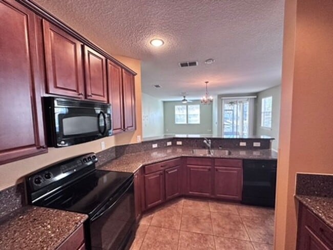 Building Photo - Stylish 3BR Townhome with Garage & Walk-In Closet