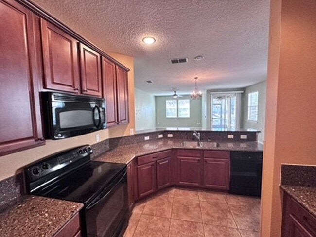 Building Photo - ***TWO WEEKS FREE*** Stylish 3BR Townhome with Garage & Walk-In Closet