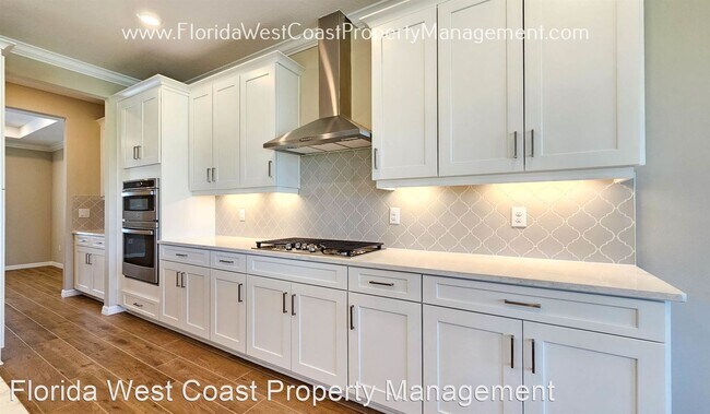 Foto del edificio - 5 br, 4.5 bath House - 10200 Milky Way Cir
