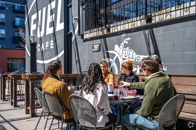 Patrons enjoy the outdoor seating at Fuel Cafe in Walker's Point.