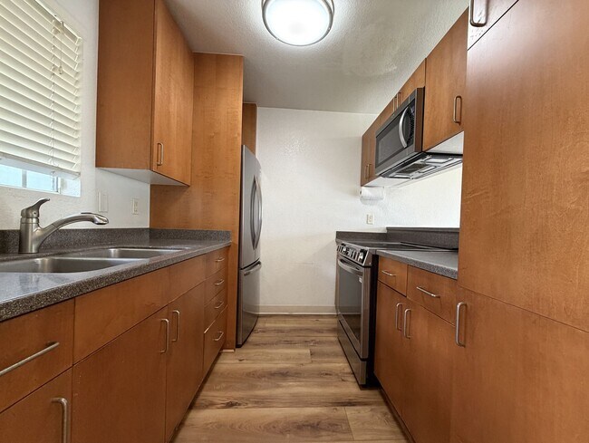 Foto del edificio - Villages at Waipio (Waipahu) - Ground Floor Unit, 2 bedroom/2 bathrooms and 1 parking stalls