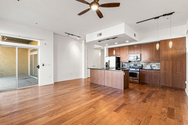 Building Photo - Fantastic Condo With Central AC And 1 Reserved Garage Parking Space!