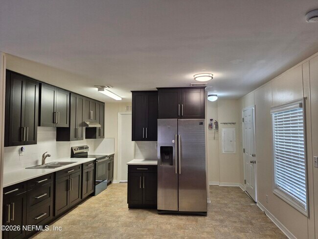 Building Photo - 5450 Normandy Acres Dr