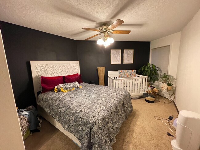 Bedroom: fits queen comfortably, lots of space for desk or even nursury. - 333 8th St SE