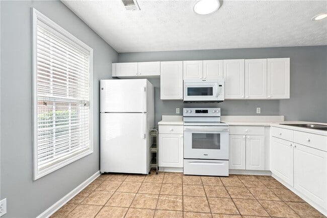 Photo - 1477 N Donahue Dr Townhome