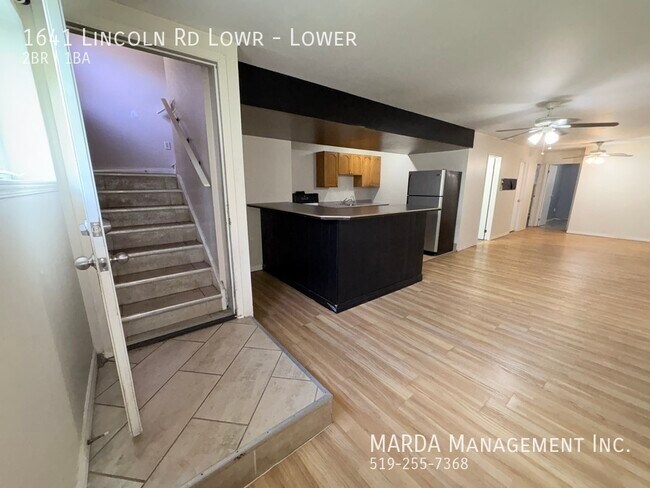 Photo du bâtiment - COZY OPEN CONCEPT 2 BED/1 BATH LOWER UNIT ...