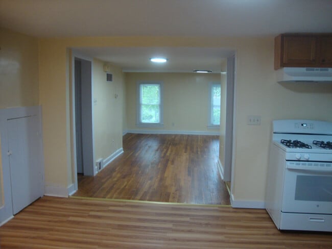 From entry, looking through kitchen to living room. - 351 W Currant St