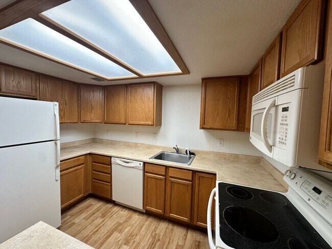 Building Photo - Charming Loft Style 2-Bedroom 2-Bath Condo with Dual Balconies