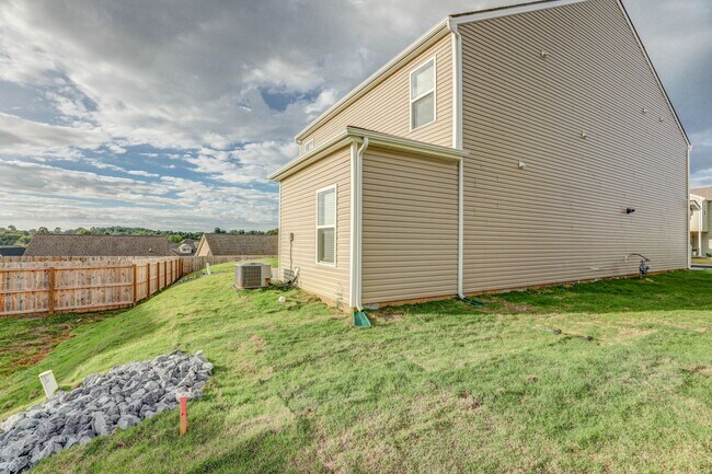 Building Photo - NEW CONSTRUCTION - 5 BDRMS, 3 BTHS, JOHNSO...