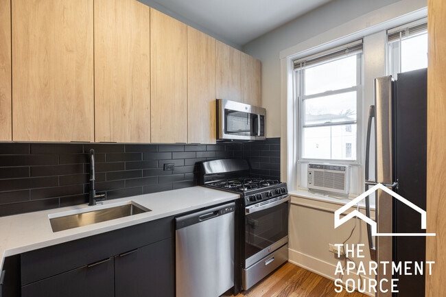 Foto del edificio - 4011 N Lowell Ave
