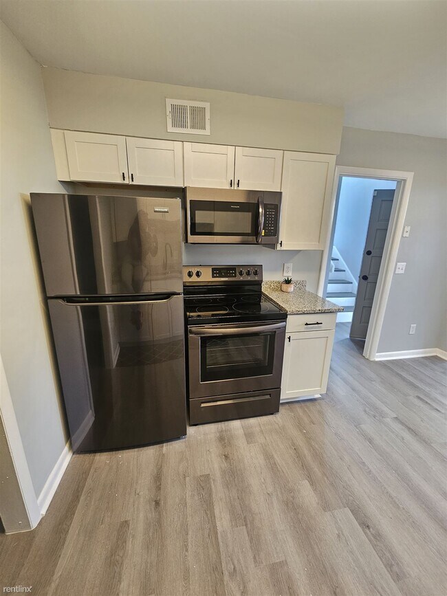 Building Photo - 3 br, 2.5 bath Townhome - 6905 Cleaton Dri...