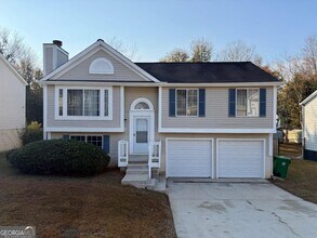 Building Photo - 6091 Raintree Bend