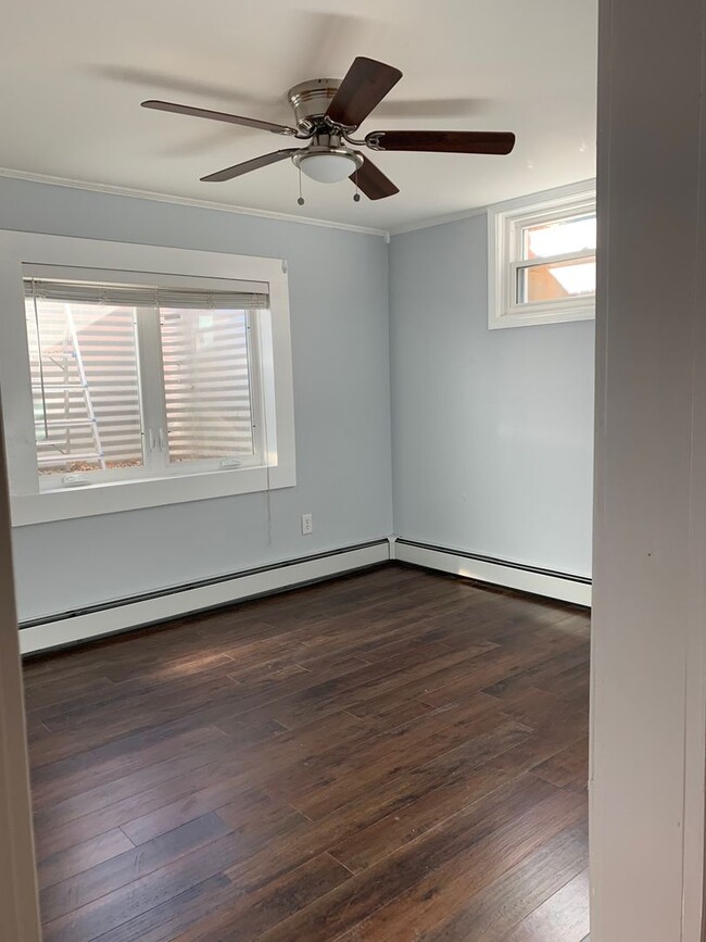Building Photo - 2 Bedroom with bonus room 1.5 Bath Lower-Level Duplex