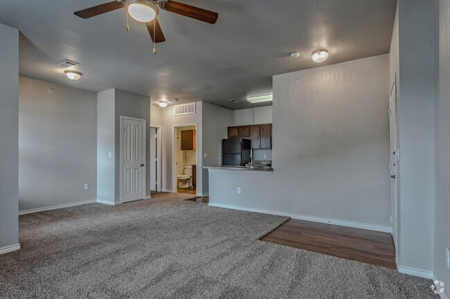 1BR, 1BA - 735 SF A1 - Living Area - SUNSET LODGE