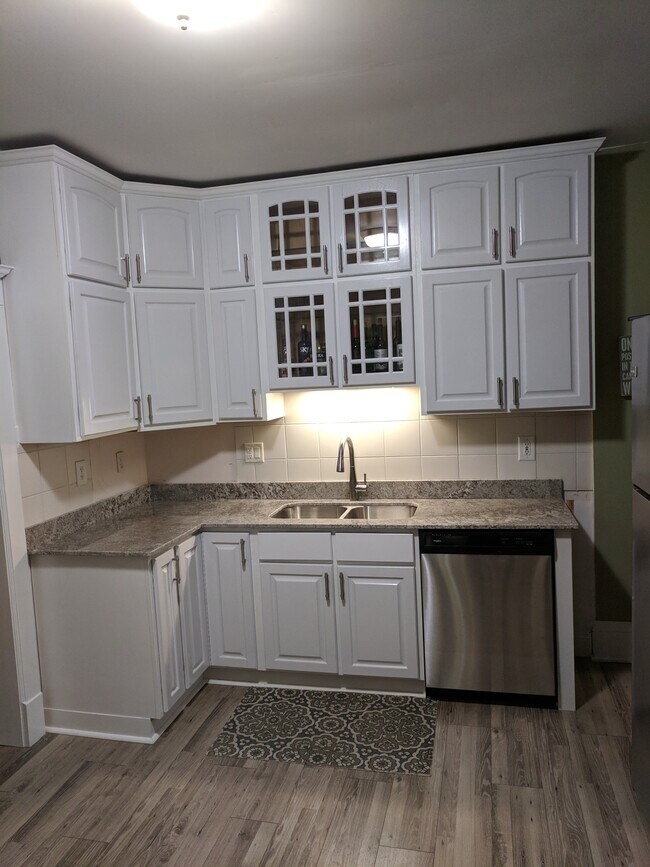Sink white cabinets and granite countertop - 2109 Girard Ave S