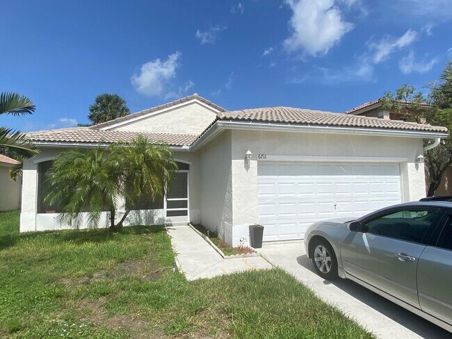 Foto del edificio - 6711 Stonecreek Street, Greenacres, FL 33413