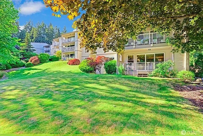 View of patio from pool - 13283 15th Ave NE