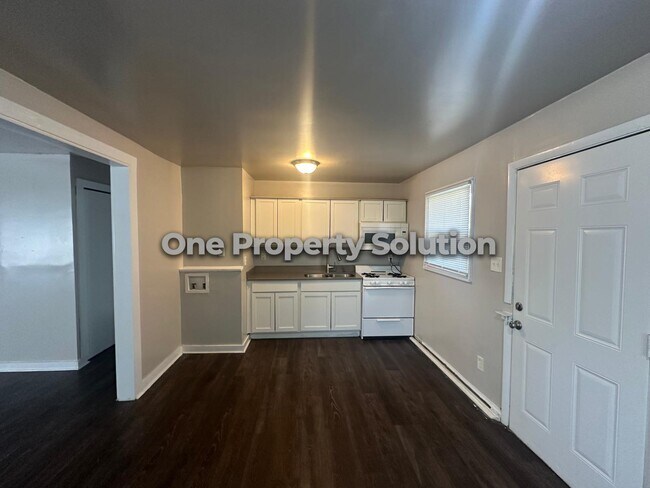Foto del edificio - 5248 E 11th Pl