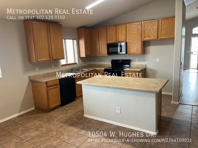 Building Photo - 10504 W Hughes Dr