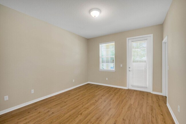 Building Photo - Beautiful 3/3/2 in Gated Amenity Rich Vill...