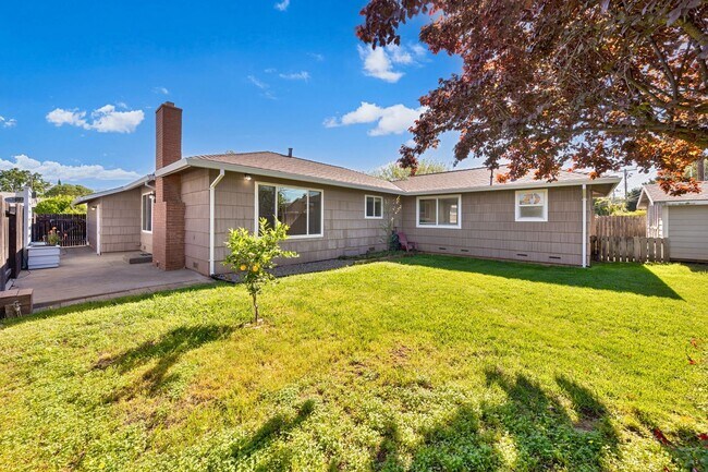 Building Photo - 3BR + Office Home in Excellent Condition with Storage Sheds and Garage Workspace!