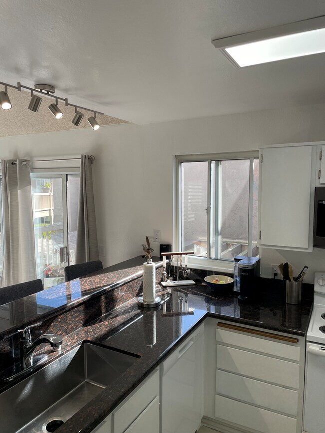 View from kitchen to patio - 930 Via Mil Cumbres