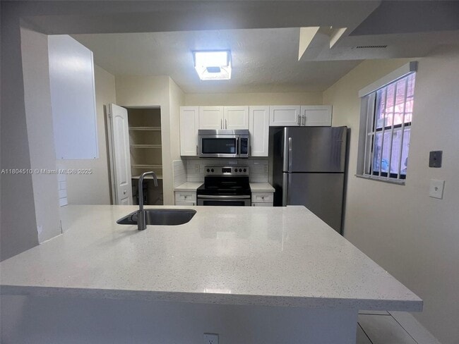 Building Photo - 6560 W 27th Ct