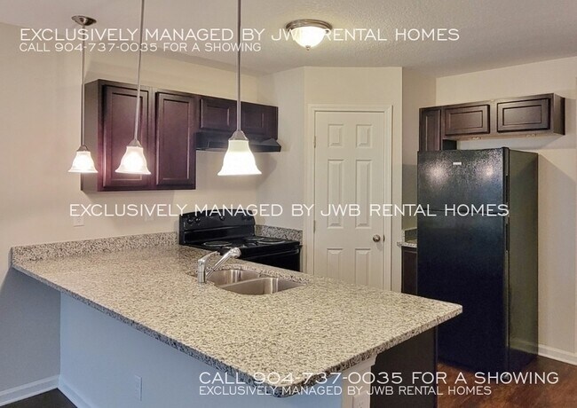 Building Photo - 8413 McGirts Village Ln