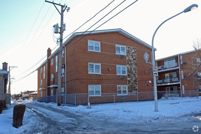 Building Photo - 6251-6255 S Mason Ave