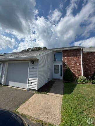 Two driveway spaces plus one garage space - 705 Lake Ave