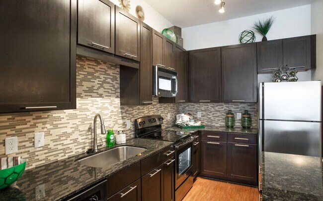Building Photo - Boutique Living with Modern Comfort!