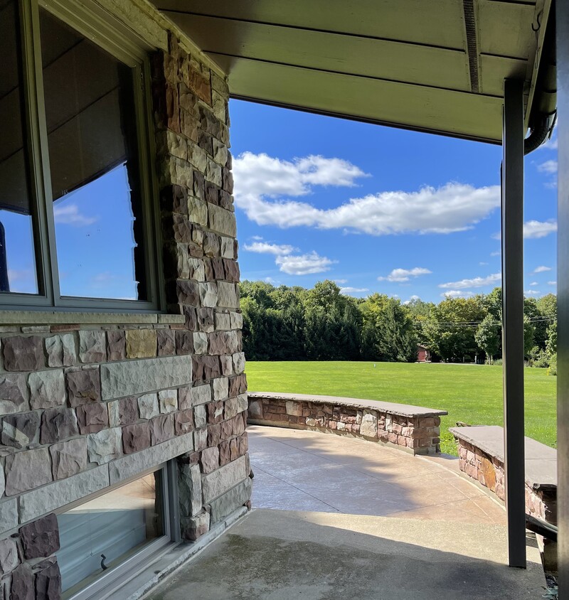 Front porch view toward patio - 13995 Centerline Rd