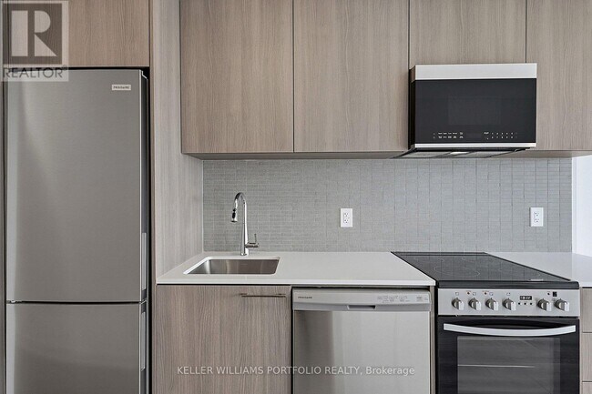 Building Photo - 7439 Kingston Rd