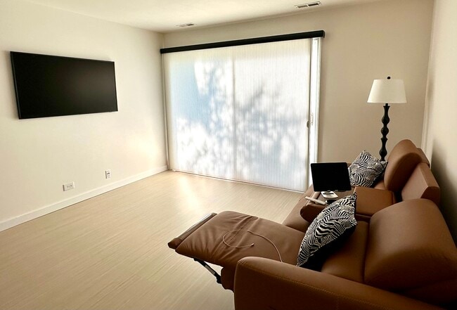 Wall mounted FRAME smart TV. High end Hunter Douglas cellular vertical screen /insulation+ - 174 Hemingway Ct