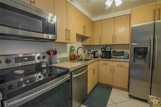 Building Photo - 3675 N Country Club Dr
