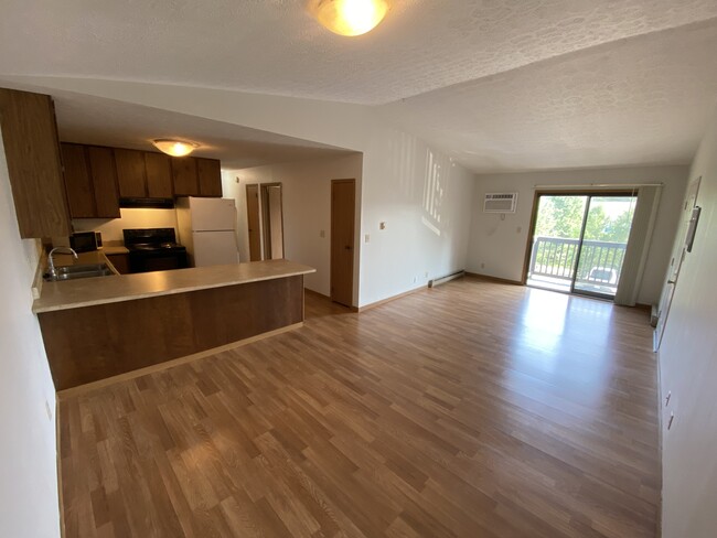 Living Room with Vaulted Ceiling - 2543 Neil Armstrong Dr