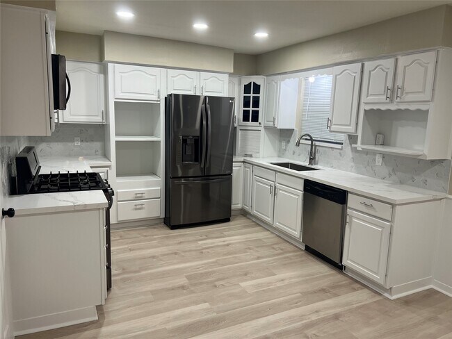 Foto del edificio - 205 W Vaughn Ln