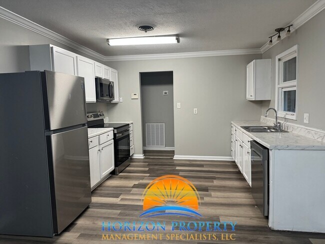 Building Photo - Newly Renovated Four Bedroom House in NW H...