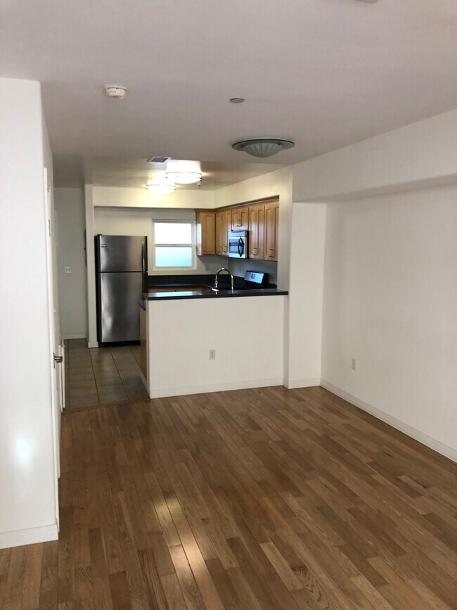 living room to kitchen - 3625 Empire Dr