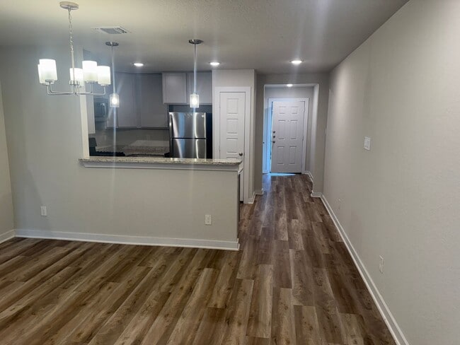 Building Photo - Stylish, Spacious & Close to It All – Your Ideal Townhome Awaits!