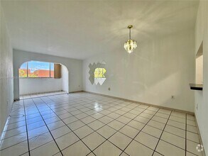 Building Photo - 1555 W 44th Pl